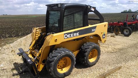 john deere skid steer made by new holland|new holland 320 skidsteer.